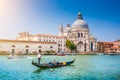 Gondola on Canal Grande with Basilica di Santa Maria della Salute, Venice, Italy Royalty Free Stock Photo