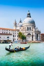 Gondola on Canal Grande with Basilica di Santa Maria della Salute, Venice, Italy Royalty Free Stock Photo