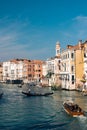 gondola on the canals of venice with many buildings and buildings lining it