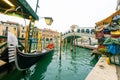 Gondola with famous Rialto bridge cross grand canal, Venice, Italy Royalty Free Stock Photo