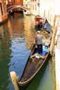 Gondola with Gondolier in Venice, Italy Royalty Free Stock Photo