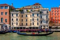 Gondola on Grand Canal in front of Hotel Regina in Venice, Italy. Royalty Free Stock Photo