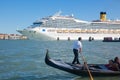 Gondola & huge cruise ship in Venice Italy