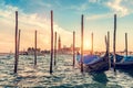 Gondola jetty in Venice, Italy at sunset.