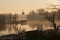 The gondola lift cable, ropeway,cableway Technical University of Wroclaw called `Polinka` over the Oder river at sunrise