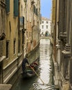 Gondola in narrow canal, Venice