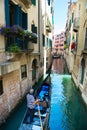 Gondola at narrow Venice canal