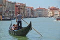 Gondola with passengers in Grand Canal. Venice, Italy Royalty Free Stock Photo