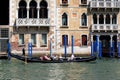 Gondola with passengers in Grand Canal. Venice, Italy Royalty Free Stock Photo