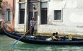 Gondolier and boat on the grand canal, Venice Italy Royalty Free Stock Photo