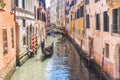 Gondola on a picturesque canal in Venice, Italy Royalty Free Stock Photo