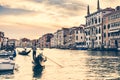 Gondola ride on Grand Canal in Venice, Italy at sunset Royalty Free Stock Photo