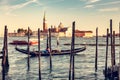 Gondola ride in Venice, Italy at sunset. Royalty Free Stock Photo