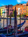 Gondola's on the Grand Canal in Venice, Italy, with stunning building backdrop.