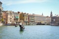 Gondola sails down the channel in Venice