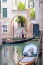 Gondola sails down the channel in Venice