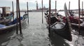 Gondola on the shining water in Venice, in front of the campanile, Italy Royalty Free Stock Photo