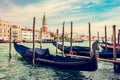 Gondola station in Venice, Italy next to Campanile tower Royalty Free Stock Photo