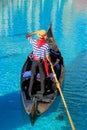 Gondola with tourists in a canal, Venetian Resort hotel and casino, Las Vegas, Nevada