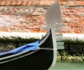 Gondola the typical Venetian boat and the background of bricks