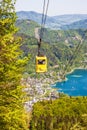 Gondola of Zwoelferhorn Seilbahn cable way and a view of alpin Royalty Free Stock Photo