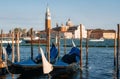 Gondolas against boats and San Giorgio Maggiore island, Venice, Italy Royalty Free Stock Photo