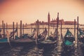 Gondolas against Venice panorama