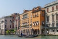 Gondolas and beautiful classical buildings on the Grand Canal, V