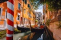 Gondolas boat floating in narrow canal of Venice city on beautiful sunny day. Italy. Europe Royalty Free Stock Photo