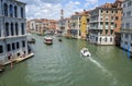Gondolas and boats with tourists crossing the Grand Canal. Venice, Italy Royalty Free Stock Photo