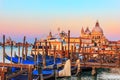 Gondolas in front of Santa Maria della Salute Church in Venice Royalty Free Stock Photo