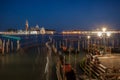 Gondolas, Grand Canal and San Giorgio Maggiore Church at night, Venice