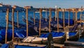 Gondolas by the Grand Canal of Venice, Italy, at dusk Royalty Free Stock Photo