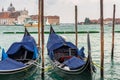 Gondolas in the harbor of Venice with San Giorgio Maggiore island, Italy