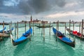 Gondolas in the harbor of Venice with San Giorgio Maggiore island, Italy