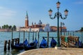 Gondolas moored near San Marco square across from San Giorgio Maggiore island in Venice, Italy Royalty Free Stock Photo