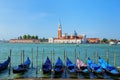 Gondolas moored near San Marco square across from San Giorgio Maggiore island in Venice, Italy Royalty Free Stock Photo