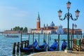 Gondolas moored near San Marco square across from San Giorgio Maggiore island in Venice, Italy Royalty Free Stock Photo