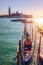 Gondolas moored near San Marco square across from San Giorgio Maggiore island in Venice, Italy. Gondolas were once the main form Royalty Free Stock Photo