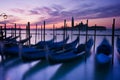 Gondolas moored by Saint Mark's square in Venice