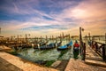 Gondolas moored by Saint Mark square, Beautiful Venice, Italy, Europe Royalty Free Stock Photo