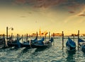 Gondolas moored by Saint Mark square