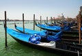 Gondolas moored by Saint Mark square. Venice, Italy Royalty Free Stock Photo
