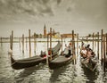 Gondolas moored by Saint Mark square