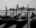 gondolas in movement without people and the church of Saint Stef