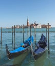 Gondolas near Saint Mark square San Marco and San Giorgio di Maggiore church in the background, in Venice, Italy Royalty Free Stock Photo