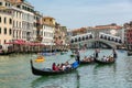 Gondolas near to the Rialto bridge on Grand canal street in Venezia Royalty Free Stock Photo