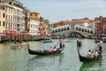 Gondolas near to the Rialto bridge on Grand canal street in Venezia Royalty Free Stock Photo