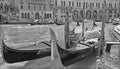 Gondolas parking is a traditional, flat-bottomed Venetian rowing boat, Royalty Free Stock Photo