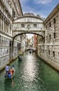 Gondolas Passing under the Bridge of Sighs, Venice Royalty Free Stock Photo